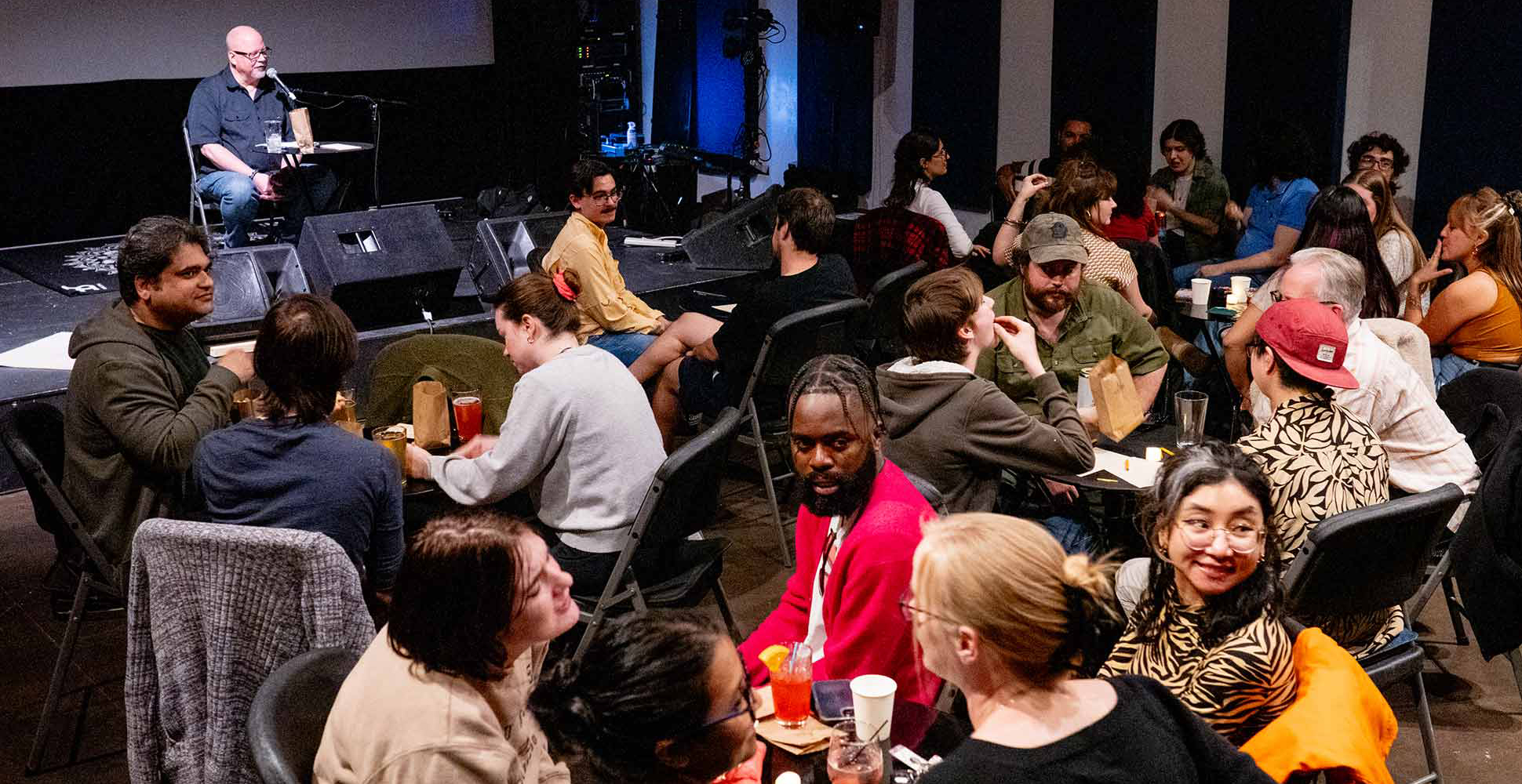 HUMANITIES TRIVIA NIGHT – the festival’s most competitive event – returned for its triumphant third iteration with master of ceremonies Mark Mobley, who expertly officiated an evening of humanities-related trivia, prizes, and fun at Ciné.